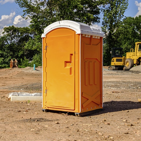 how often are the porta potties cleaned and serviced during a rental period in Gilman